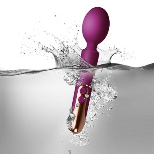 Rocks Off Oriel Rechargeable Wand Vibrator in fuchsia submerged in water