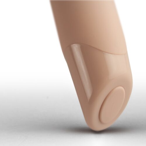 Close-up of a skin-tone vibrator with a control button