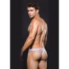 Man in a fitted thong with a muscular physique
