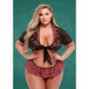 This stylish outfit combines lace and plaid for a fun and flirty look. Model in a lace top and plaid skirt