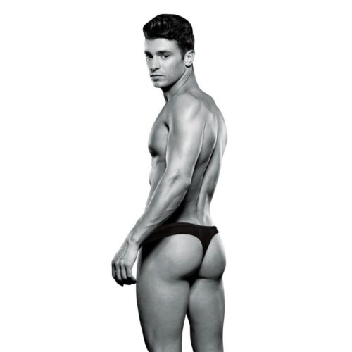 Muscular male model in a black thong