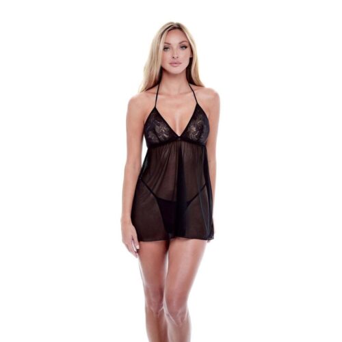 Model in a sheer black nightgown with floral detailing