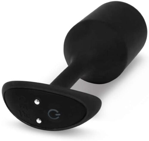 Black device with a curved design and buttons
