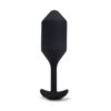 A sleek black tapered plug