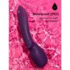 We-Vibe Wand 2 Wand Vibrator in purple, waterproof, on a pink water surface