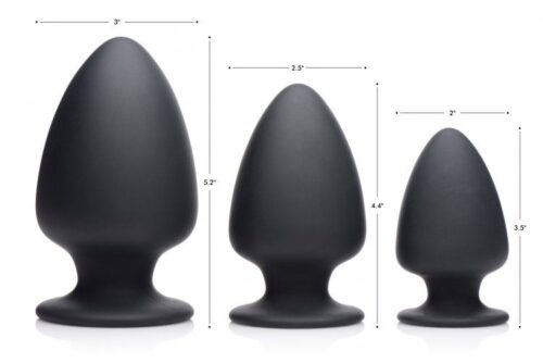 Three black silicone butt plugs of varying sizes