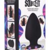 Black squeezable anal plug packaging with features shown