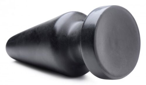 A black conical object with a rounded top