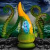 Vibrant yellow and green silicone tentacle dildo with a glowing orb
