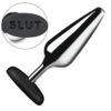 Metal butt plug with a black base labeled 'SLUT'
