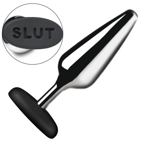 Metal butt plug with a black base labeled 'SLUT'