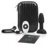 b-Vibe anal play kit with a black vibrating plug, remote control, USB charger, and guide