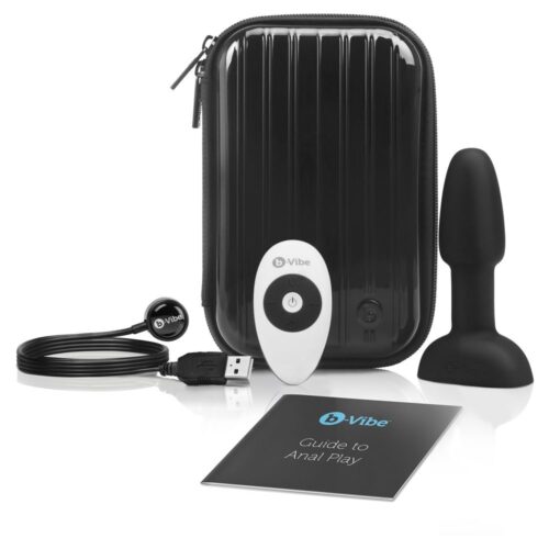 b-Vibe anal play kit with a black vibrating plug, remote control, USB charger, and guide