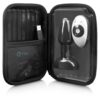 Black storage case with a toy and remote control