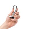 Hand holding a stainless steel P-spot training set