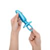 Blue silicone adult toy held by hands
