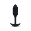 Discover pleasure with this stylish black silicone anal plug, designed for comfort and safety. Black silicone anal plug with a tapered tip and flared base, available at The Loving Company.