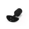 Explore New Sensations With This Sleek Black Plug, Available Now. A Sleek Black Plug With A Power Button, Available At The Loving Company.