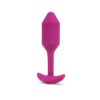 Discover New Sensations With This Stylish Pink Silicone Toy. A Tapered Pink Silicone Toy With A Flared Base, Available At The Loving Company.