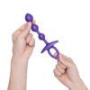 Purple silicone anal toy held in hands