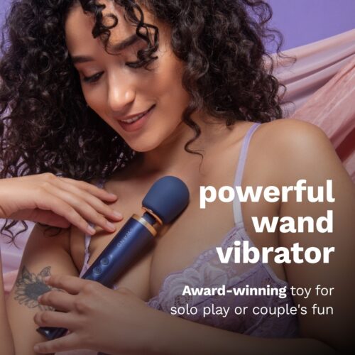 Le Wand Petite Rechargeable Wand Vibrator held by a woman
