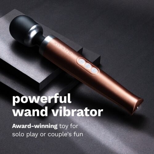 Le Wand Diecast Rechargeable Wand Vibrator in bronze, showcasing its sleek design and butt