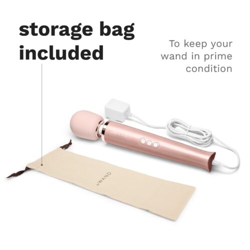 Le Wand Powerful Plug In Vibrating Wand Massager with a pink head, rose gold handle, and storage bag, available at The Lov...