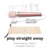Le Wand Powerful Plug In Vibrating Wand Massager, charging adapter, plugs, and storage pouch, available at The Loving Comp...