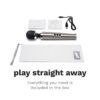 Le Wand Diecast Rechargeable Wand Vibrator Massager with user guide, USB cable, and storage pouch, available at The Loving...