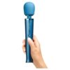 A hand holding a blue Le Wand Petite Rechargeable Wand Vibrator Massager