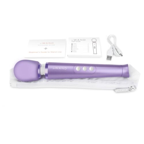 Le Wand Petite Rechargeable Wand Vibrator in purple, user guide, and USB cable