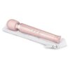 Le Wand Petite Wand Vibrator in gold, lying on a white storage pouch