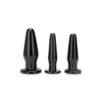 Three black silicone anal plugs of different sizes