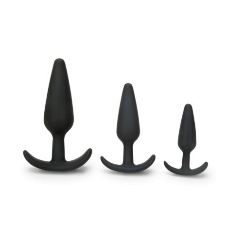 Three black silicone anal plugs of different sizes
