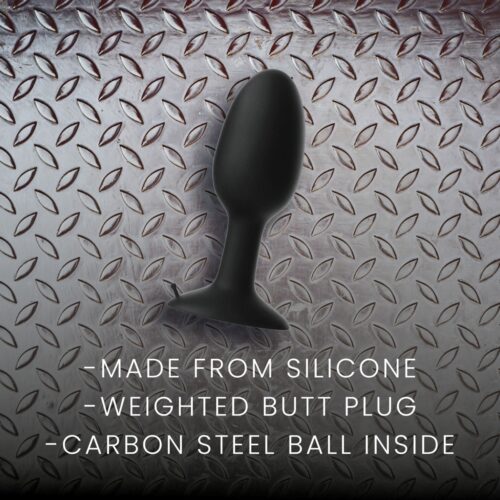 Black silicone weighted butt plug with carbon steel ball inside