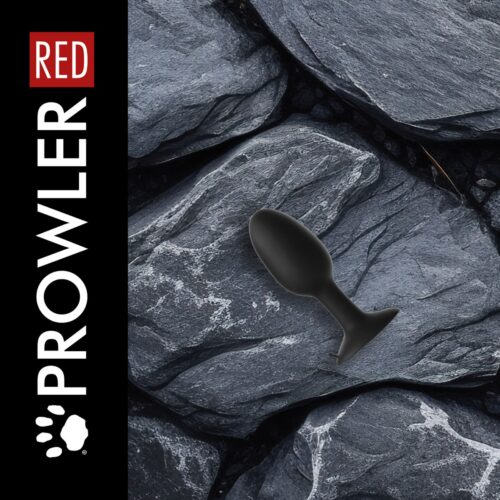 A black plug on a textured gray stone surface