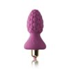 Pink raspberry-shaped vibrator with a gold base