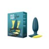 ROMP Bass anal plug in teal and yellow, next to its packaging