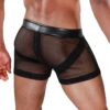 Model wearing black mesh boxer shorts with leather waistband