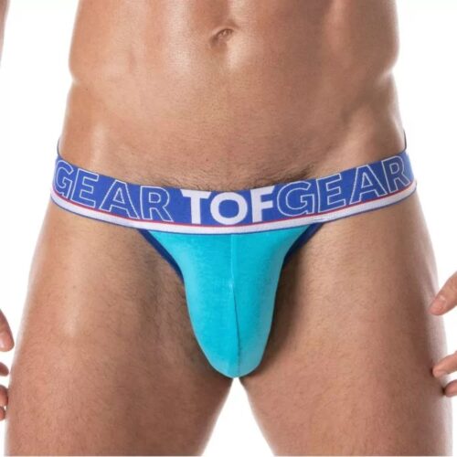 A man wearing a turquoise thong with a 'TOF GEAR' waistband