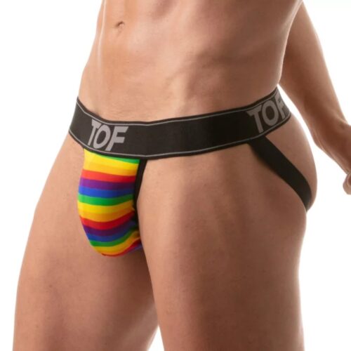 A man in a rainbow-striped thong by TOF