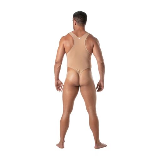 A man in a tan bodysuit stands with his back to the camera