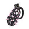 Cellmate Flexispike Chastity Cage with black spikes and pink accents