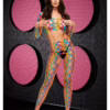 A model showcases a rainbow crop top and pants set with zigzag patterns