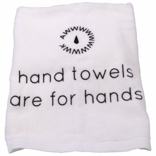 White hand towel with 'hand towels are for hands' text