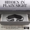 A black sleep maskis tucked in a drawer beneath a bed