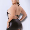 Black criss cross wetlook halter mini dress on a model