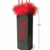 Express your affection with this playful gift bag, perfect for any occasion. Gift bag with red fluffy trim and the text 'I Fucking Love You!'