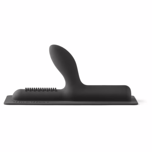 Discover the innovative design of this pleasure product, available at The Loving Company. Curved black silicone product with textured surface