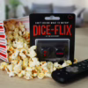 Let the dice decide your next movie night with Dice-Flix! Dice-Flix pack with dice, popcorn scattered, and a remote control